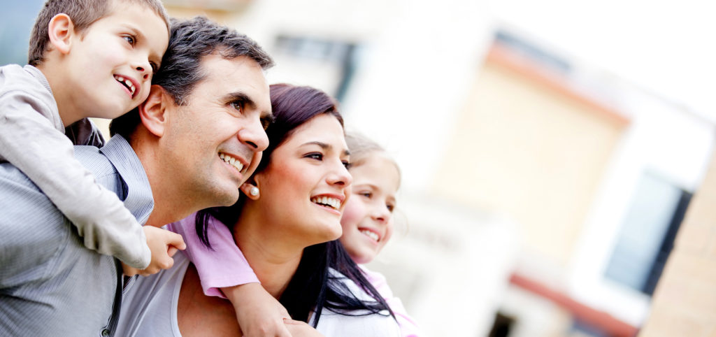 Family looking at their home they wish to sell